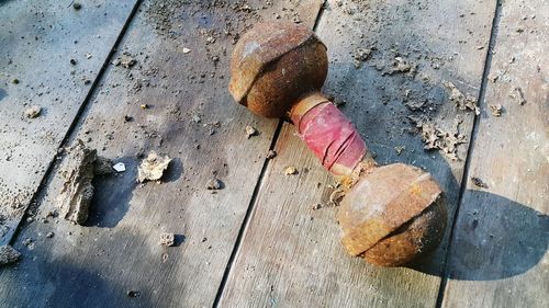 High angle view of rusty metal on table