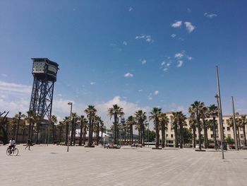 Panoramic view of city against blue sky