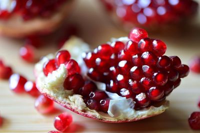 Close-up of pomegranate seeds on table