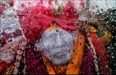 Close-up of water drops on glass