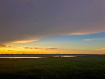 Scenic view of landscape at sunset