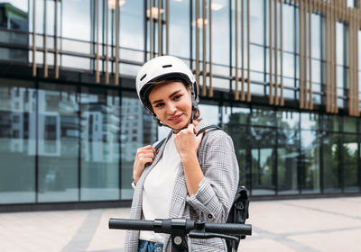 Portrait of young woman in bus