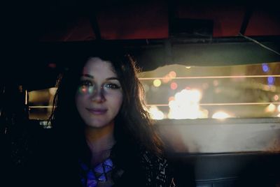 Portrait of woman at night