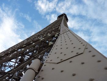 Low angle view of historical building against cloudy sky