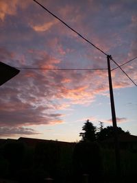 Low angle view of dramatic sky at sunset