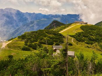 Scenic view of landscape and mountains against sky