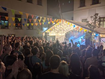 Crowd at music concert at night