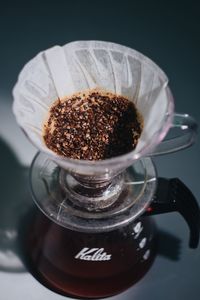 High angle view of coffee cup on table