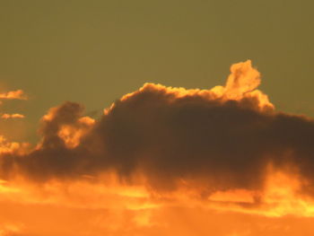 Low angle view of dramatic sky during sunset