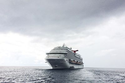 Ship in sea against sky