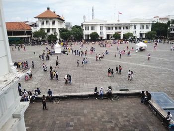 Group of people in front of historical building