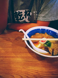 Close-up of man having food