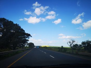 Road seen through car windshield