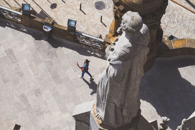 High angle view of people on rock