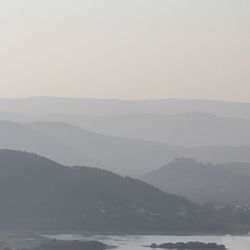 Scenic view of mountains during foggy weather