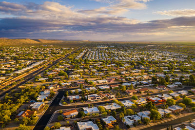 High angle view of cityscape against sky during sunset