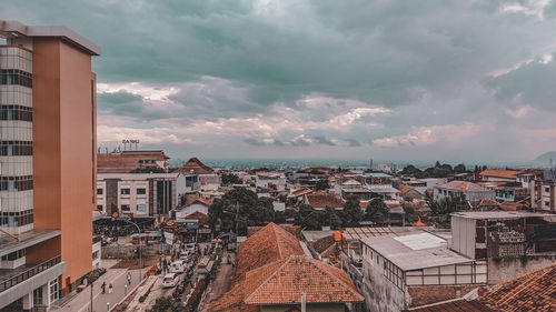 High angle view of townscape bandung against sky