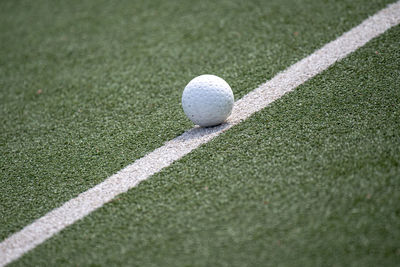 Close-up of ball on grassland