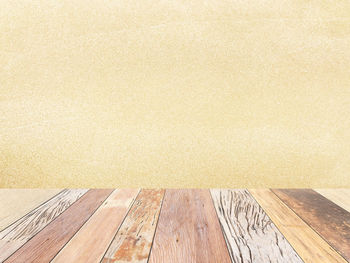 Top view old wood plank on sand beach texture background