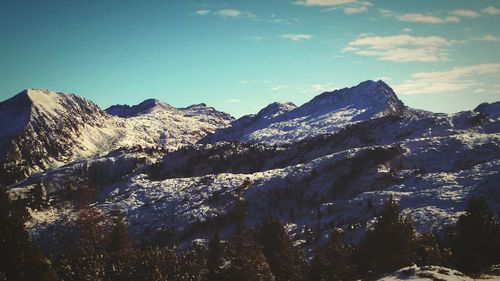 Scenic view of snow covered mountains