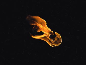 Close-up of fire against black background