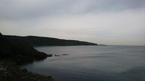 Scenic view of bay against sky