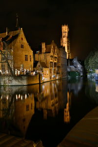 Illuminated buildings in city at night