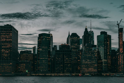 View of buildings against cloudy sky