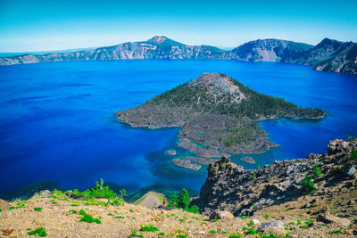 View on the colorful crater lake with wizard island, oregon