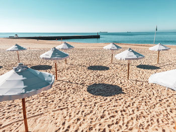 Scenic view of beach against clear sky