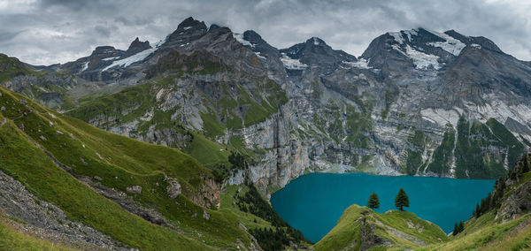 Panoramic view of lake and mountains against sky