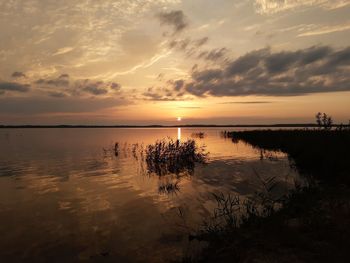 Scenic view of sea against sky during sunset