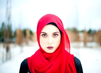 Portrait of young woman wearing headscarf