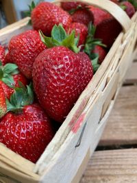 High angle view of strawberries in bowl on table