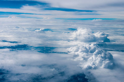 Aerial view of cloudscape over sea against sky