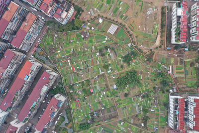 High angle view of street amidst buildings in town