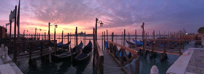 Boats moored at harbor