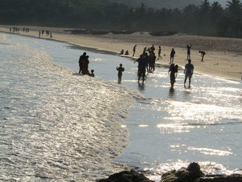 People enjoying at beach