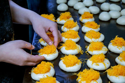 High angle view of person preparing food