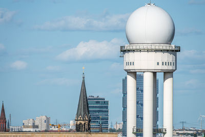 Low angle view of modern buildings against sky