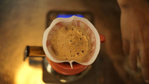 High angle view of coffee cup on table