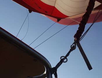 Low angle view of sailboat against clear sky