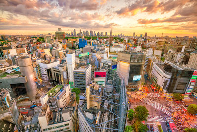 High angle view of buildings against sky during sunset