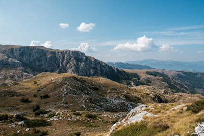 Scenic view of rocky mountains against sky