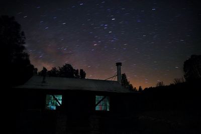 Low angle view of built structure at night