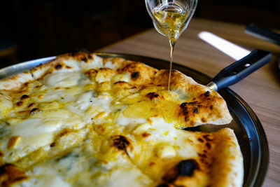 Close-up of pizza served in plate