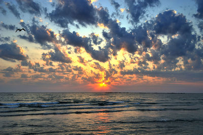 Scenic view of sea against sky during sunset