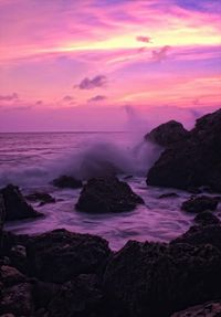 Scenic view of sea at sunset