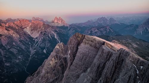 Scenic view of mountains against sky during sunset