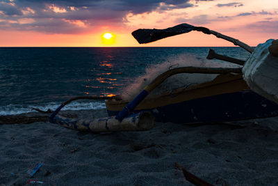 Scenic view of sea against sky at sunset